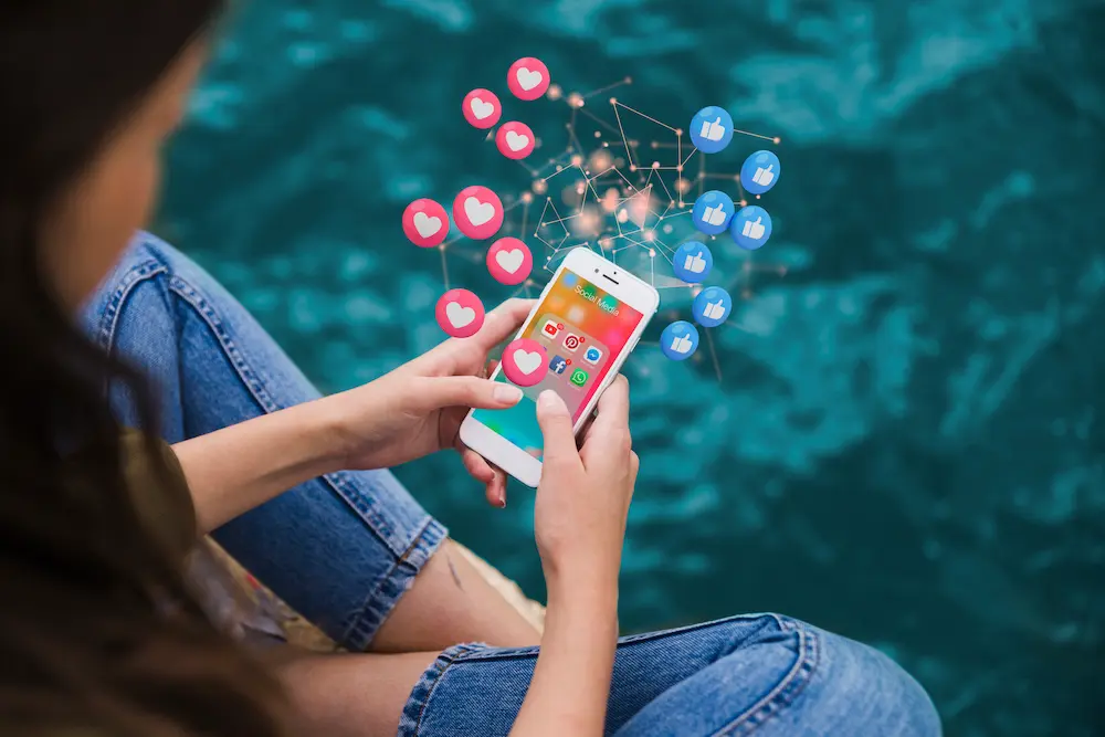high-angle-woman-holding-smartphone high-angle-woman-holding-smartphone